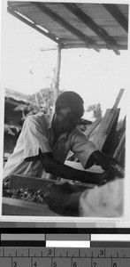 Man doing woodwork, Africa, October 1949
