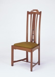 Tall side chair of Honduras mahogany and ebony with upholstered seat