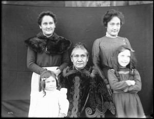 Group portrait of Mrs. Scott, a Christian Indian educated by the white man, with her daughters and granddaughters