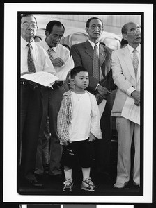 Four elderly men of Vietnamese origin & young child of Vietnamese origin in foreground, Our Lady of Peace, San Jose, California, 2002