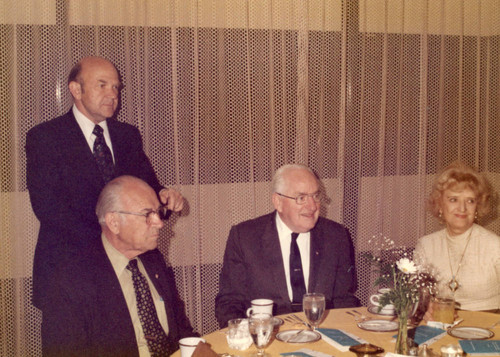 Dr. Young standing at the Left (Color)