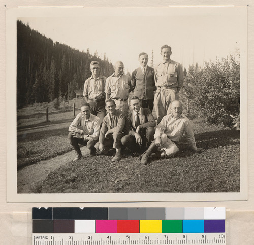[Robert Marshall in a group picture with other men outside.]