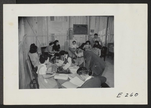 Interviewers in the Placement Office at this relocation center. W. C. Love is the Placement Officer. Photographer: Parker, Tom Denson, Arkansas
