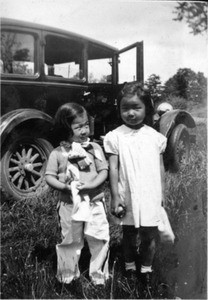 Selma Hahn and another girl in front of car