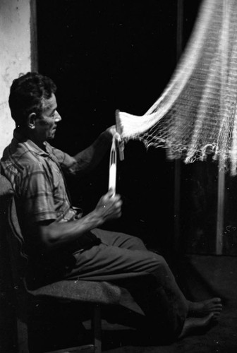Mending a fishing net, La Chamba, Colombia, 1975