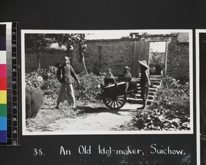 Man being transported in cart, Suixian, China, ca.1937