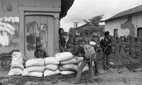Sandinistas on a street corner, Nicaragua, 1979