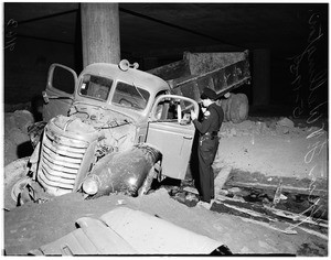 Truck runs into concrete pylon, Hollywood freeway underpass, 1951