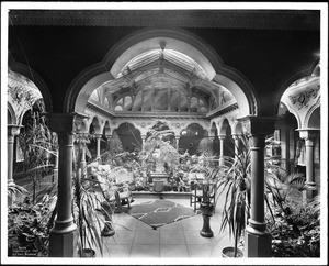 Interior view of atrium inside of the Gail Borden Jr. residence in Alhambra, 1903