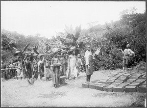 Girls carrying bricks, Tanzania, ca. 1900-1914