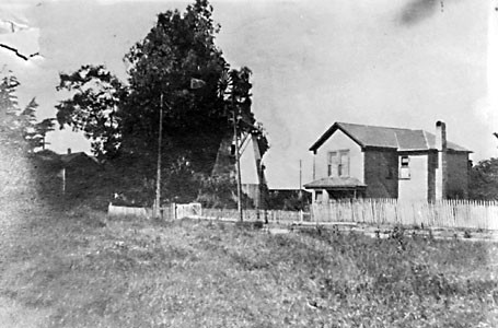 Unidentified home with windmill