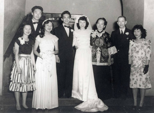 Wedding photo, from left to right are: Esther Louie, Andrew, Alice, Johnny, Katie, Ko Po Kwok (mother), Wai Shing Kwok (father), Sarah (oldest sister)