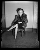 Actress Carole Landis seated in court during divorce from Willis Hunt Jr., 1940