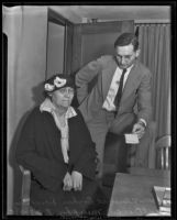 Captain Owen Murphy with Mrs. Florence Boykin Dowling, accused of murdering Gladys G. Fair, Long Beach, 1935