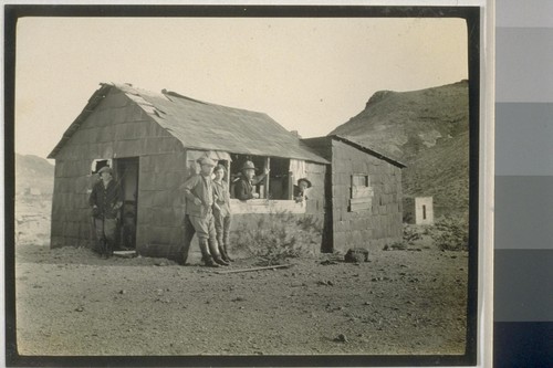 Building material was so scarce in Rhyolite that most anything went, here an enterprising citizen made himself a house of the cans; A Tin Can House