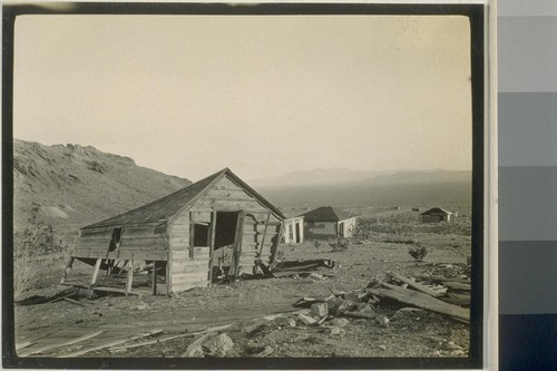 On our hike thru the town we came across many shacks like this one. Rhyolite is surrounded by land that is full of gold but the main vein is yet to be found, the hills show many try-outs one may be seen on the hill back of this shack; The ravages of "Time."