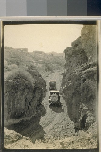 We leave Calico, above on the bluff may be seen the ruins of the adobe houses. Sat., Jan. 16 left at 9:40 a.m.; the road in the canyon below Calico