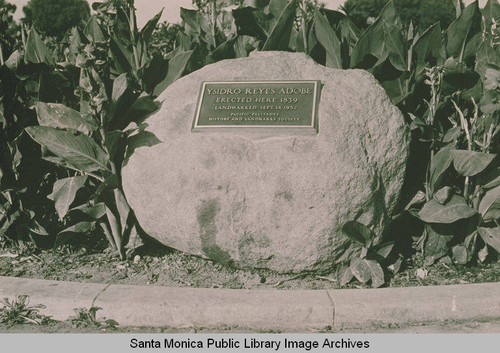 Plaque reads "Ysidro Reyes Adobe erected here 1939, landmarked September 14, 1952, Pacific Palisades History and Landmark Society."