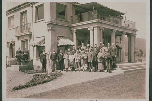 Sales people in front of Harmony Hall when it was a sales office in Las Pulgas Canyon, Calif