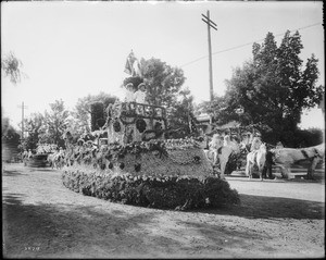 The motorized Altadena float parading down the street in the Pasadena's Tournament of Roses Parade, ca.1906