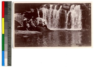 People next to a waterfall, Guangdong, China, ca.1913-1923