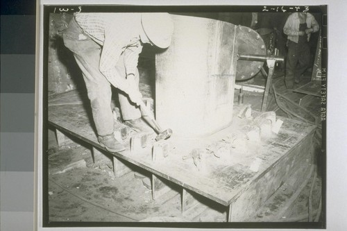 Workers and equipment. February 16, 1943