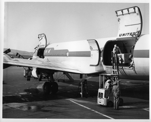 IBM Data Processing Equipment Being Loaded Onto Transport Plane