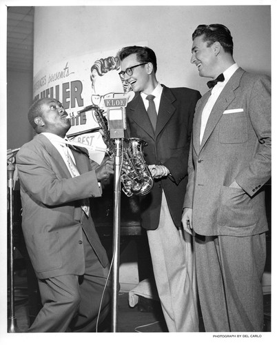 Saxophone Player, Frank Darien, Jr., and Unidentified Male During a KLOK Show