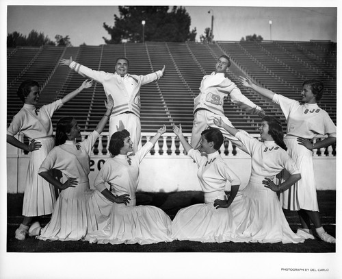 Female and Male San Jose State College Cheerleaders Striking a Pose