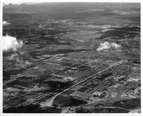 Aerial View Across Santa Clara, CA with Moffett Airfield in the Far Distance