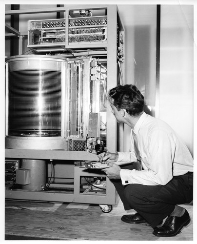 Unidentified Male Inspecting the Core of a Large IBM Data Processing Machine