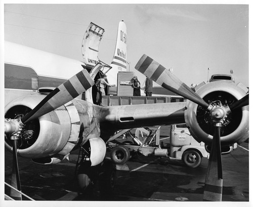 IBM Data Processing Equipment Being Forklifted Onto a Transport Plane