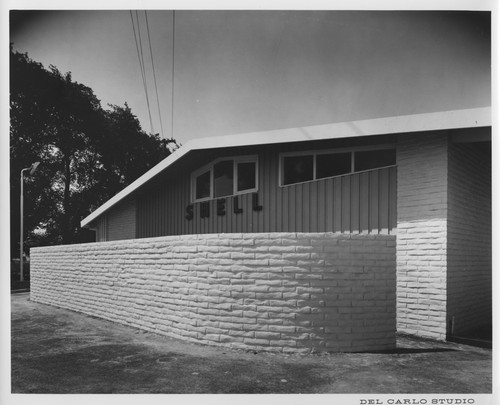 Brick Wall of the Shell Gas Station Adjacent to the Mobil Country Club, Inc