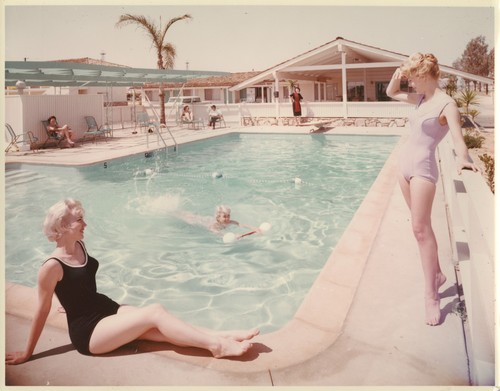 Oxnard MoteLodge Guests Enjoying Themselves at the Motel Pool