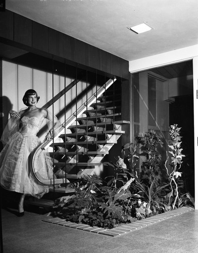 San Jose State College Kappa Alpha Theta Member on Staircase of Sorority House