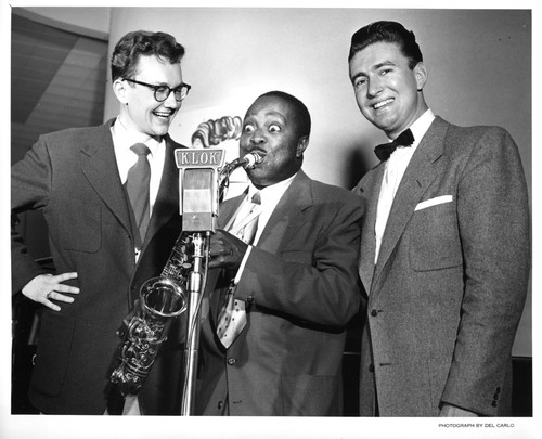 Saxophone Player, Frank Darien, Jr., and Unidentified Male During a KLOK Show