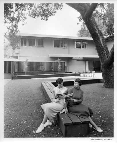 Two SJSC Kappa Alpha Theta Members Sitting Outside Their Sorority House