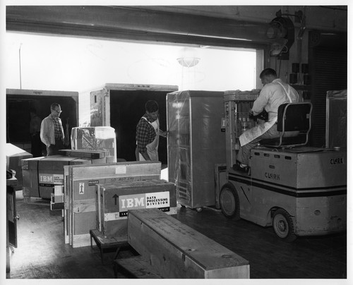 Boxed IBM Data Processing Machine Components Being Forklifted Onto Truck