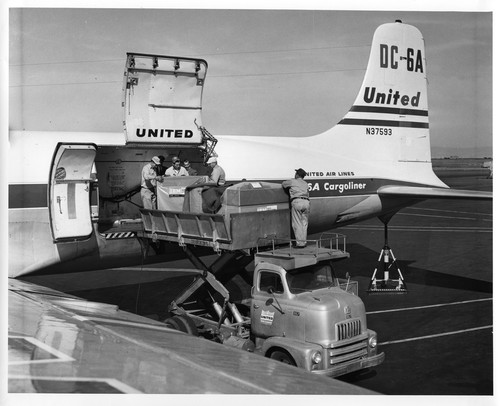 IBM Data Processing Equipment Being Forklifted Onto a Transport Plane