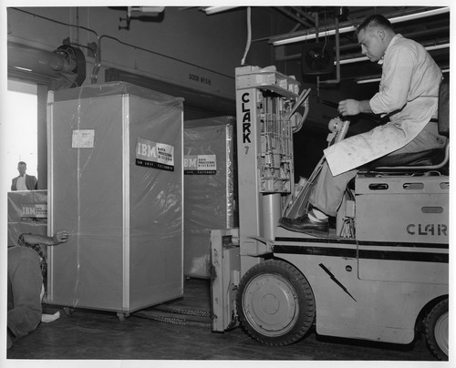 Boxed IBM Data Processing Machines are Forklifted in Preparation for Shipment