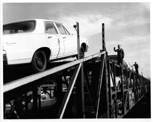 Cars Being Loaded onto a Freight Train at the Fremont GMC Plant