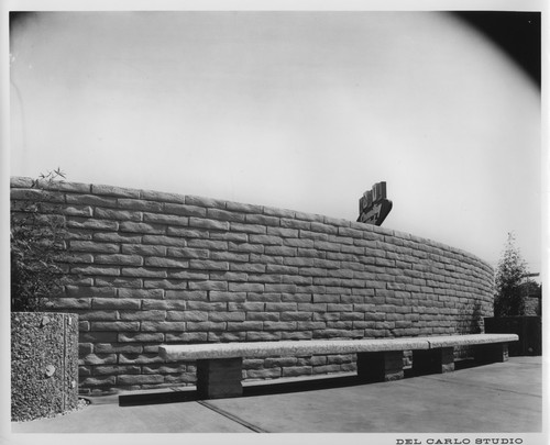 Brick Wall of the San Jose Mobil Country Club with Benches