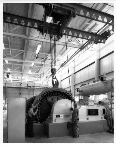 Heavy Machinery Being Lowered Into Place at the Fremont GMC Assembly Plant