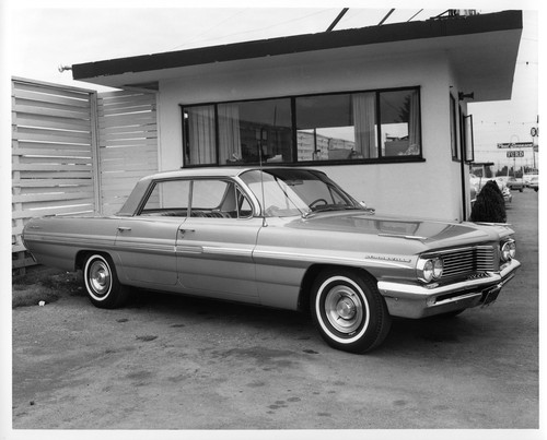 First Generation Pontiac Bonneville Parked Near Swanson Ford Dealership