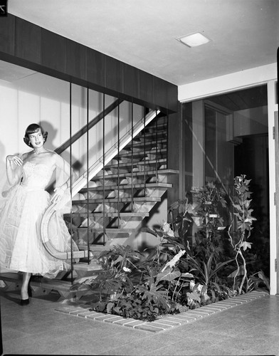 San Jose State College Kappa Alpha Theta Member on Staircase of Sorority House