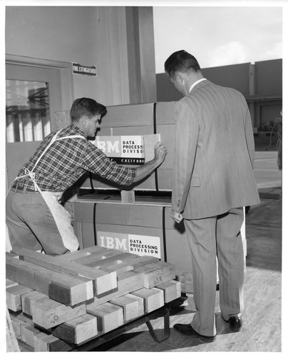 Image Showing IBM Data Processing Machines Being Prepared for Shipping