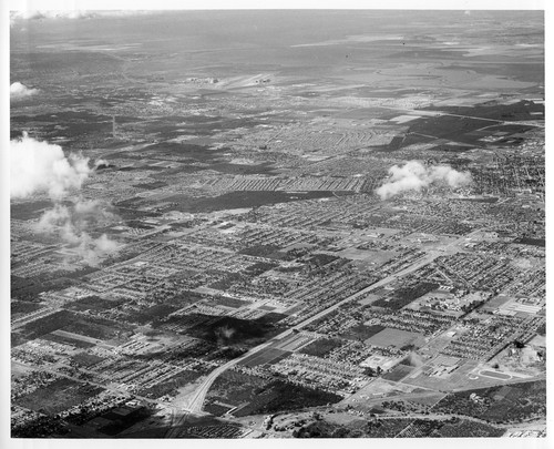 Aerial View Across Santa Clara, CA with Moffett Airfield in the Far Distance