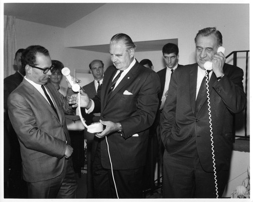 Unidentified Males Shown Conversing on Telephones