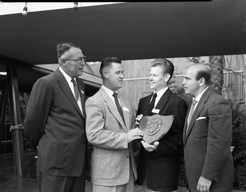 San Jose State College Phi Epsilon Kappa Members with Fraternity Plaque