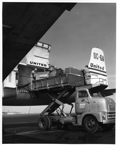 IBM Data Processing Equipment Being Forklifted Onto a Transport Plane